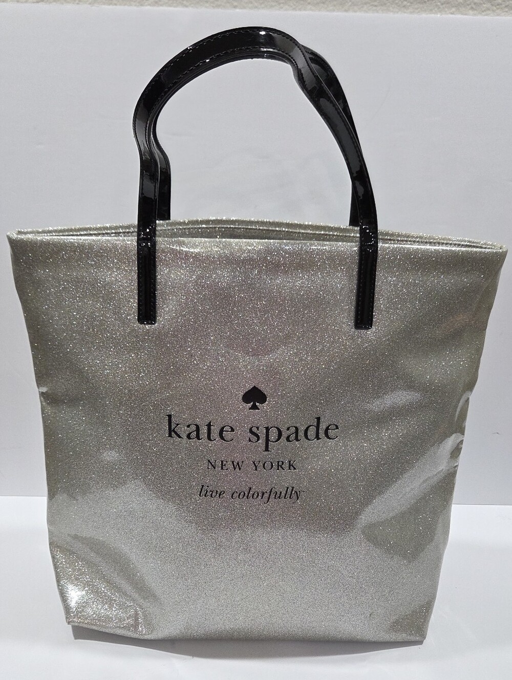 Kate Spade New York Holiday Drive Silver Sparkle Bon Shopper Tote Bag.